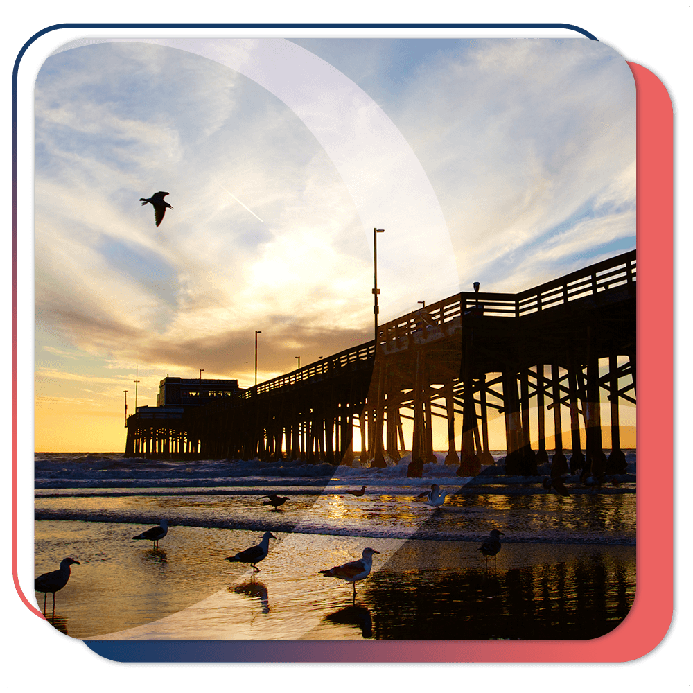 pier over the ocean at sunset in Newport Beach California